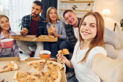 Selfie photo. Group of friends have party indoors together.