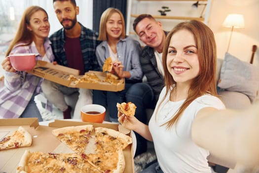 Selfie photo. Group of friends have party indoors together.