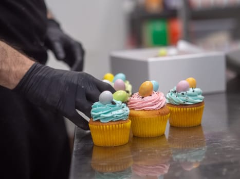 easter pastel handmade group of muffins with confetti chocolate eggs on top
