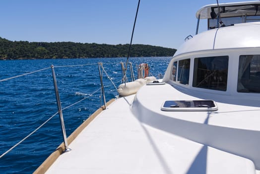 Sailboat sailing in the Mediterranean Sea at sunny summer day. Cruising luxury yacht. Vacation in Croatia, Italy, Greece