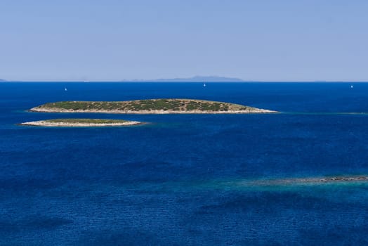 An island in the adriatic sea. Green island in blue adriatic sea , Dalmatia, Croatia. Travel destination, paradise, Travel concept