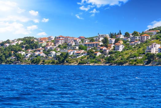 Trogir town panoramic view. UNESCO world heritage site panoramic view in Dalmatia, Croatia, tourist destination. View of sea coast in Trogir town with colorful houses