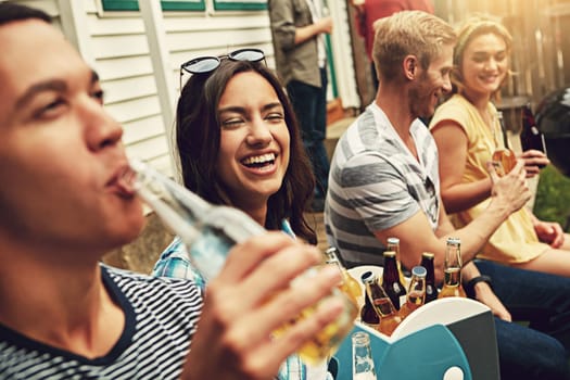 Everyones having a good time. a group of friends enjoying a party outdoors