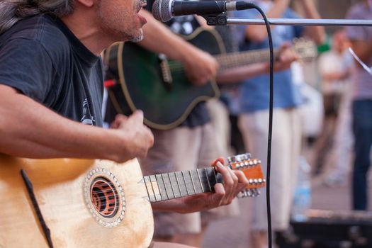 Guitar player during the street concert