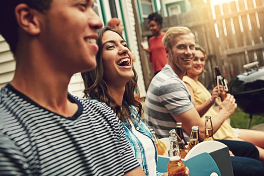 Just chill out. a group of friends enjoying a party outdoors