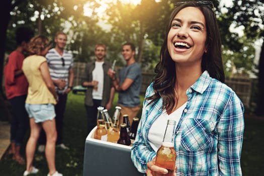 Bring on the bliss. a young woman enjoying a party with friends outdoors