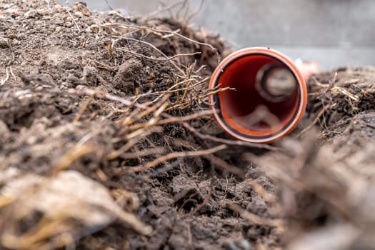 plastic pvc waste sewer pipe in the ground. High quality photo