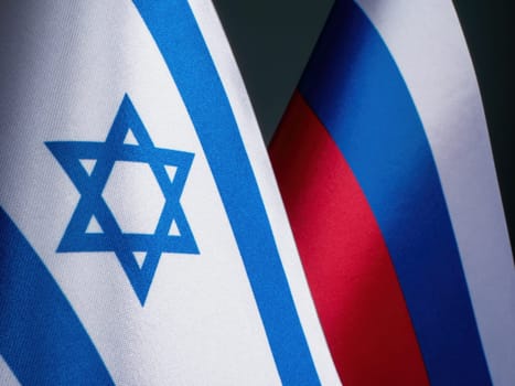 A Flag of Israel next to the flag of Russia.