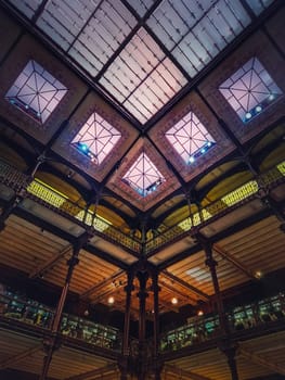 Architectural details of the glowing glass ceiling inside the Museum of Natural History, Paris, France
