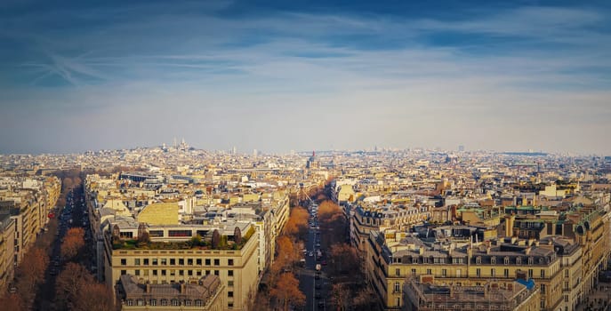 Paris cityscape panoramic view to Sacre Coeur Basilica of Montmartre, France. Beautiful parisian architecture with historic buildings and landmarks
