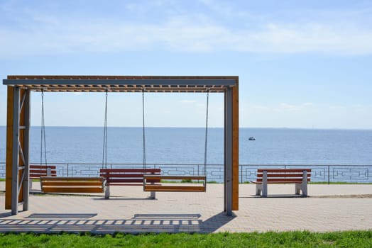 Swings on the Swings on the beach with Wood balcony