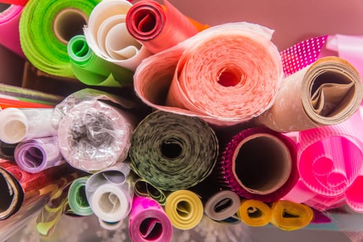 Rolled up plastic or polyethylene colored packaging object wrapper material.