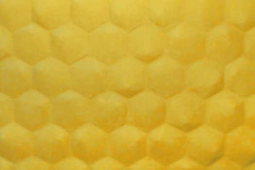 Honeycomb pattern abstract yellow background hexagonal geometric shape wall design modern interior.