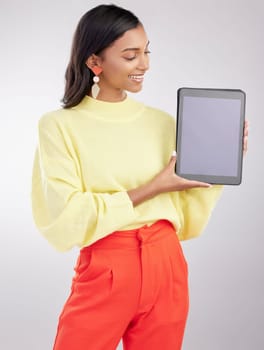 Happy, tech and woman with a tablet, screen and connection on a white studio background. Female person, technology and model with a device, internet and communication with social media and networking.