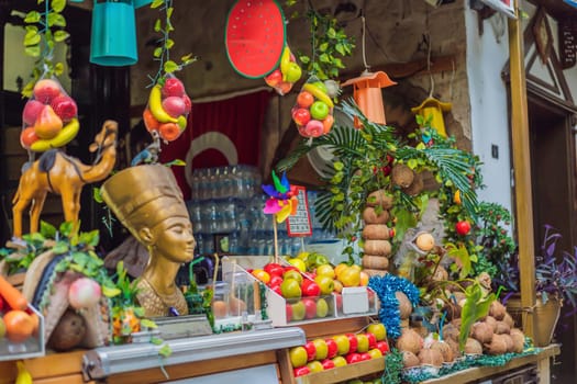 Local fresh juice shop rustic look on street with citrus and pomegranates .