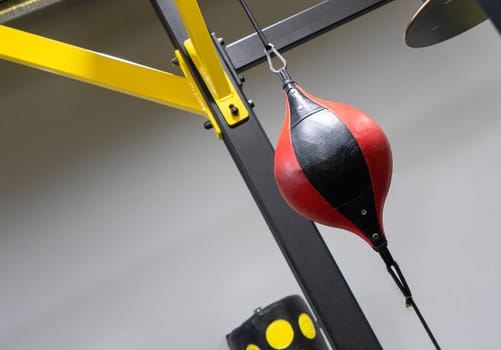 A closeup of a boxing punching bag in the sports complex