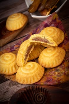 Traditional eid maamoul or mamoul cookies with dates, nuts, and jam, Arabic sweets for Aid al-Fitr and easter, High quality photo