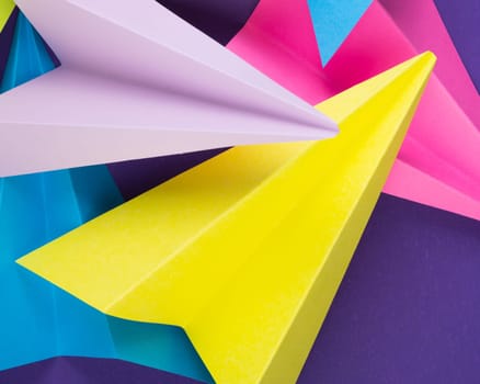 A closeup shot of colorful handmade paper planes