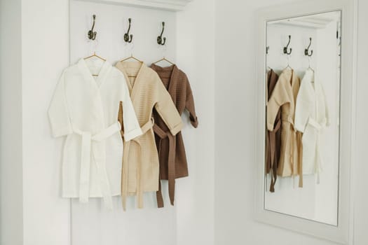 linen bathrobe hanging on a hanger