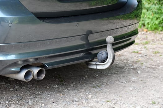 Close up of rear apron, exhaust and trailer hitch of German station wagon