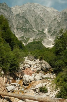 Dry, stony riverbed in summer in the Leogang mountains, Austria