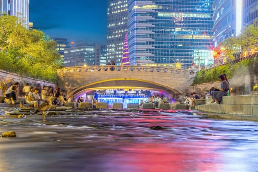 Cheonggyecheon, a modern public recreation space in downtown Seoul, South Korea at night