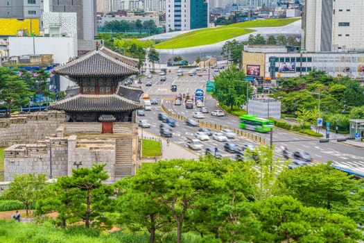 Downtown Seoul city skyline at Dongdaemun Gate, cityscape of South Korea at sunset