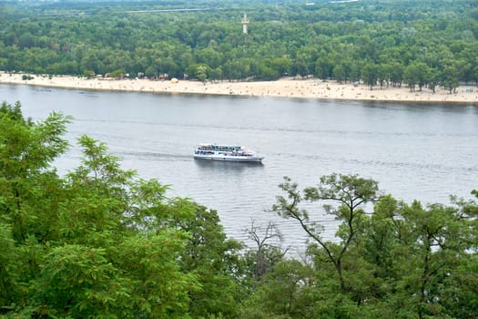 a vessel larger than a boat for transporting people or goods by sea or river