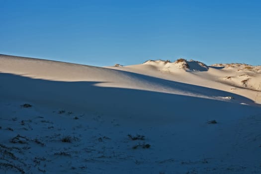 White sand dunes along the Namaqualand Atlantic coastline.