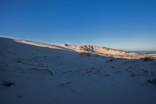 White sand dunes along the Namaqualand Atlantic coastline.