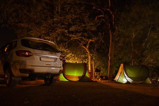 Campsite with two tents at night in Kruger National Park. South Africa
