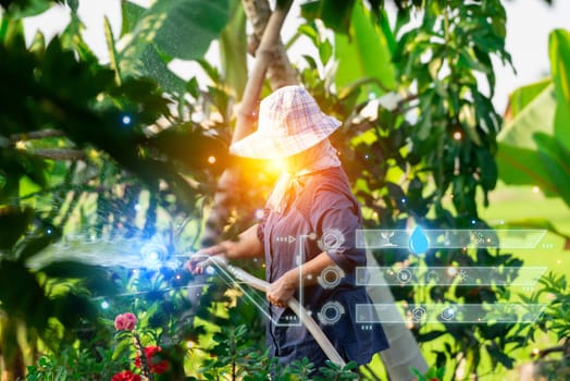 Smart farm digital icon and futuristic AI data infographic of Asian woman gardener watering the lawn plants and trees in agriculture garden for fresh and growth at outdoors countryside