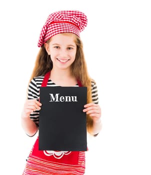 Little girl in chef uniform holding menu mockup with copy space in hands isolated on white background