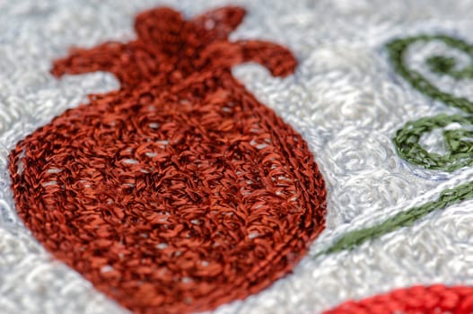 A closeup shot of national ornaments and patterns of Central Asia on a piece of cloth