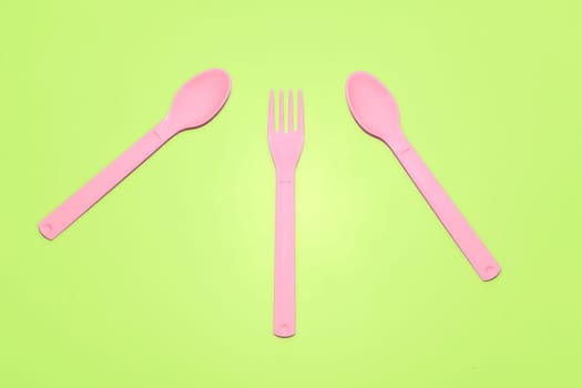 an implement with two or more prongs used for lifting food to the mouth or holding it when cutting