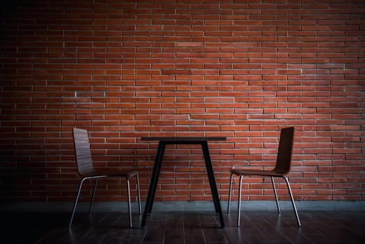 Cafe or restaurant in balcony view decorate with red brick wall and table chairs set for seating relax