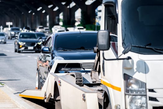 Car damaged crash from car accident on the road wait insurance in a city collision in Bangkok Road, accidents are a major problem of traffic in Thailand.