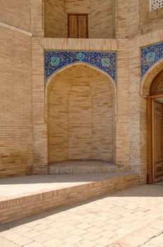 A vertical shot of an old traditional building in Central Asia