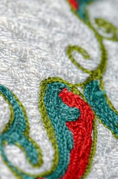 A closeup shot of national ornaments and patterns of Central Asia on a piece of fabric