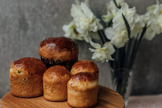 Delicious Easter cake and ingredients on wooden table.