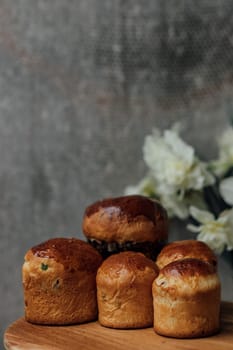 Delicious Easter cake and ingredients on wooden table