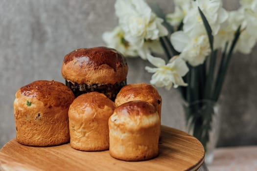 Delicious Easter cake and ingredients on wooden table