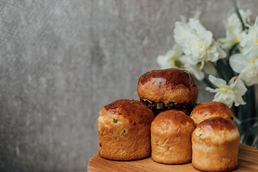 Delicious Easter cake and ingredients on wooden table