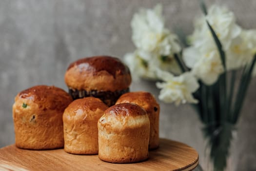 Delicious Easter cake and ingredients on wooden table