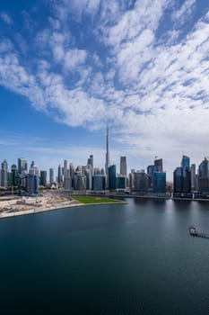 Dubai, UAE - April 1, 2023: Skyline of downtown district from apartment in Business Bay