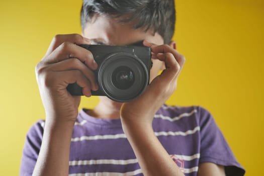 A men is taking pictures on a camera