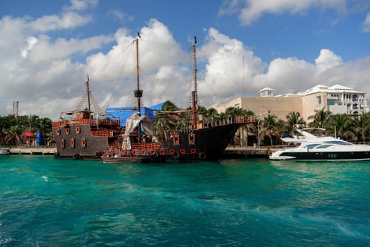 The boat in the Caribbean Sea on a sunny day. Clear water.