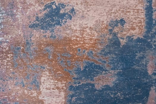 Blue paint old spots traces pattern outdated on the texture of rusty metal background steel grunge obsolete stain.