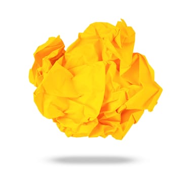 Yellow colored crumpled paper rolled into a ball, isolated on a white background, Save clipping path.
