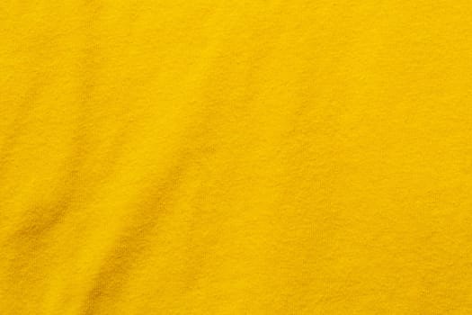 Abstract yellow fabric with soft wave texture background
